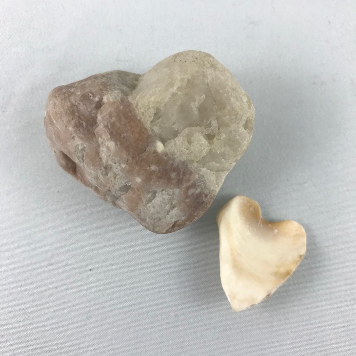 pink heart stone and heart shaped shell